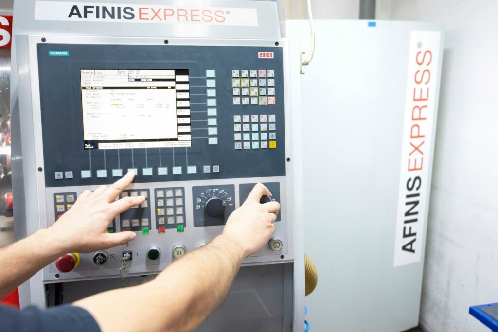 A manufacturing professional operating connected equipment